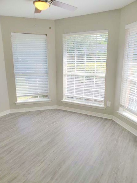 Bay window in 2nd bedroom with ceiling fan