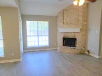 Wood burning fireplace with gas starter